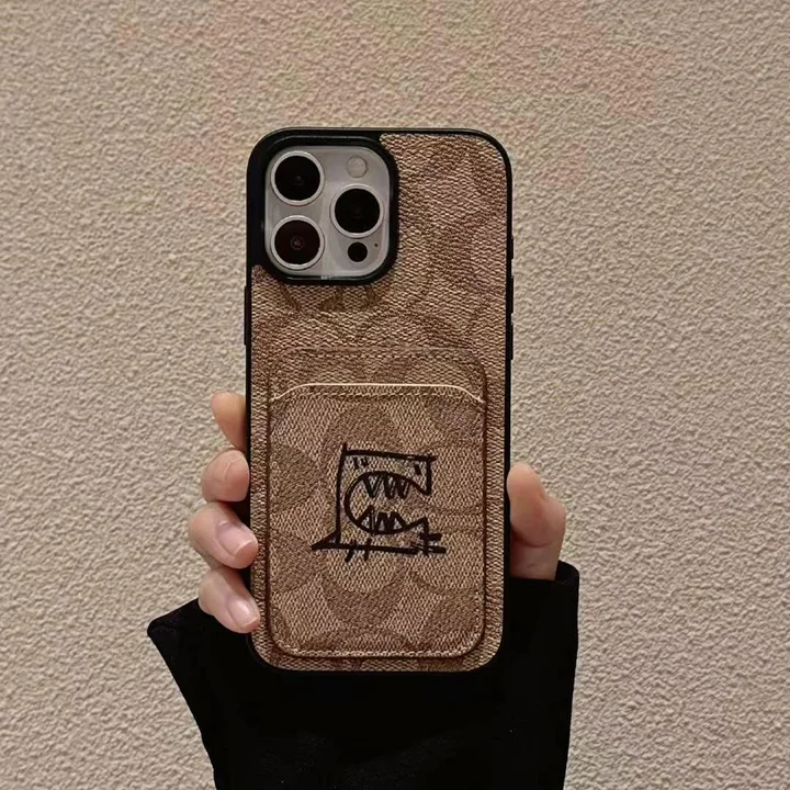  コーチ スマホケース